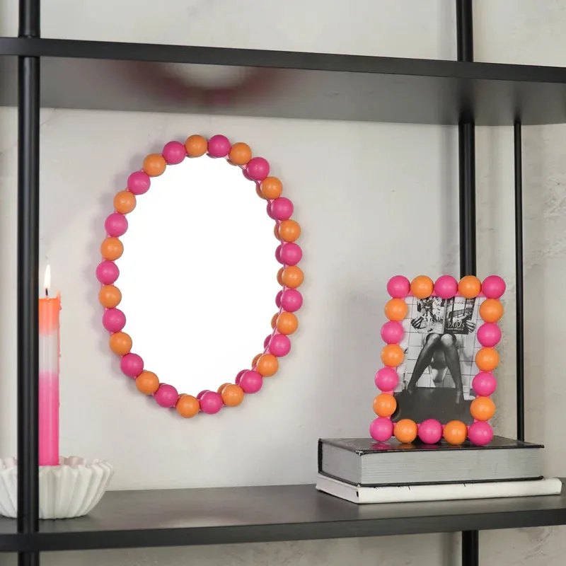 Amiek Bolletjesrand wandspiegel oranje roze 29 cm