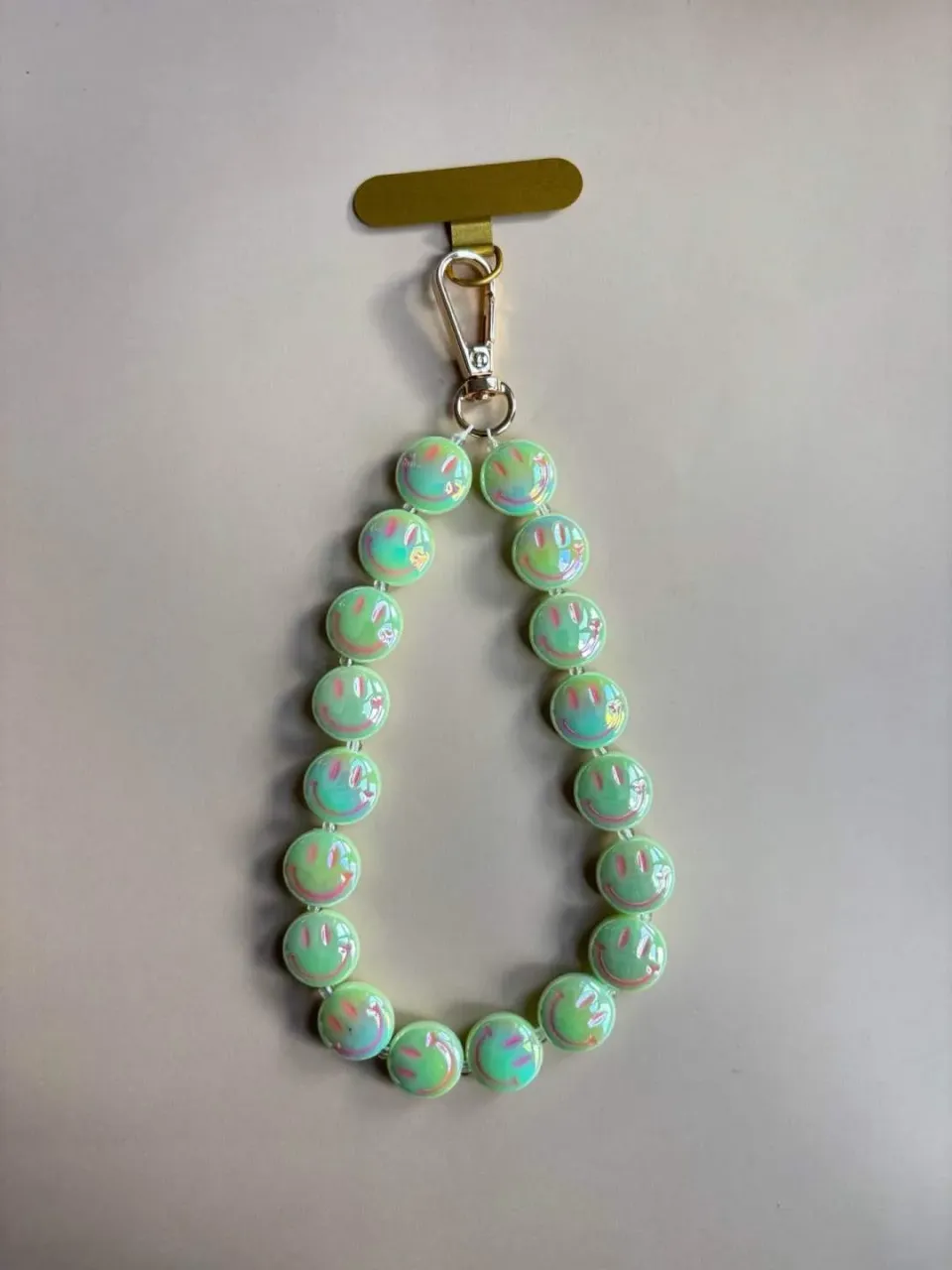 Amiek Smiley telefoonkoord groen met gouden clip