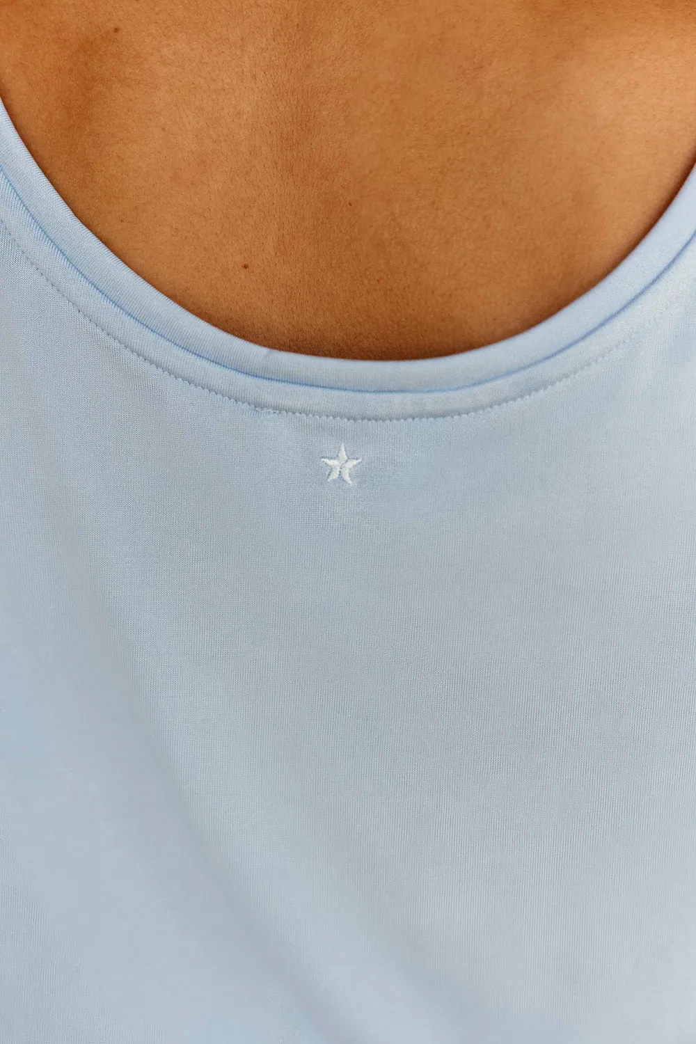 La Petite Etoile Diya top lichtblauw soepel ster