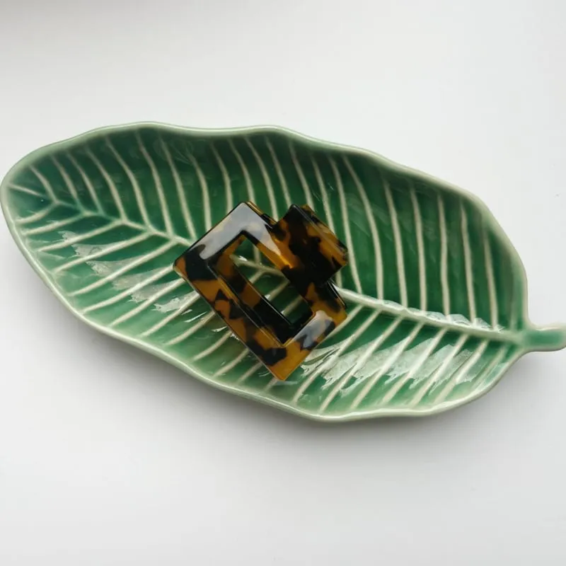 Amiek Babette hairclaw tortoise oranje zwart